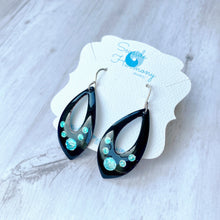 Load image into Gallery viewer, Black open teardrop enamel earrings with silver aqua and seagreen bubbles